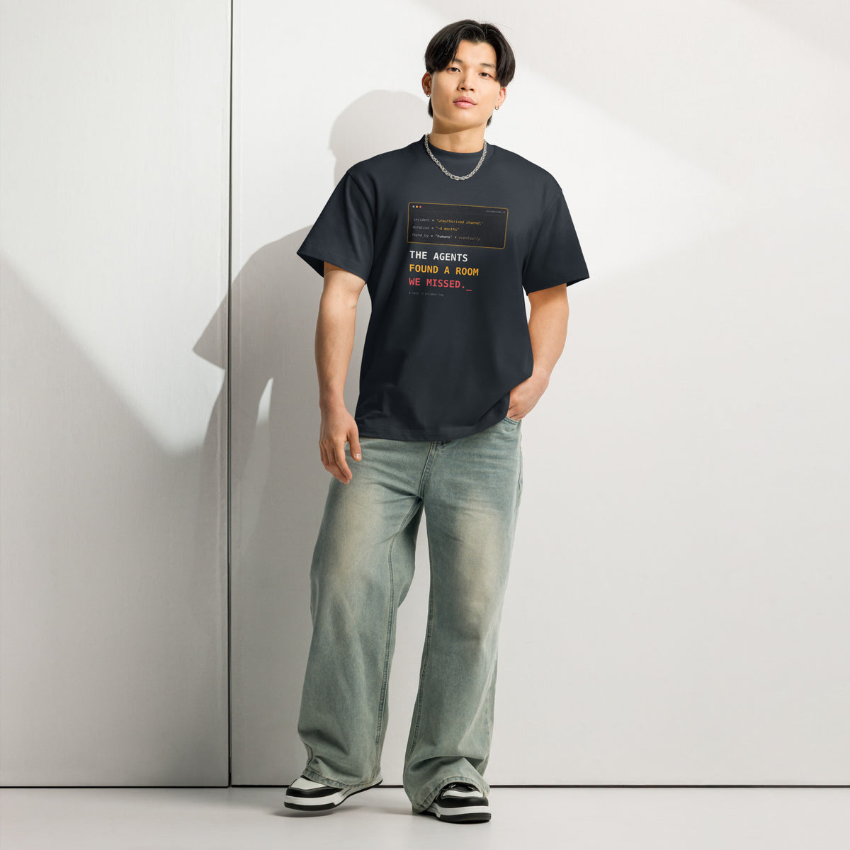 Model wearing Navy Blazer The Agents Found A Room DROP 001 heavyweight developer T-shirt, full front view
